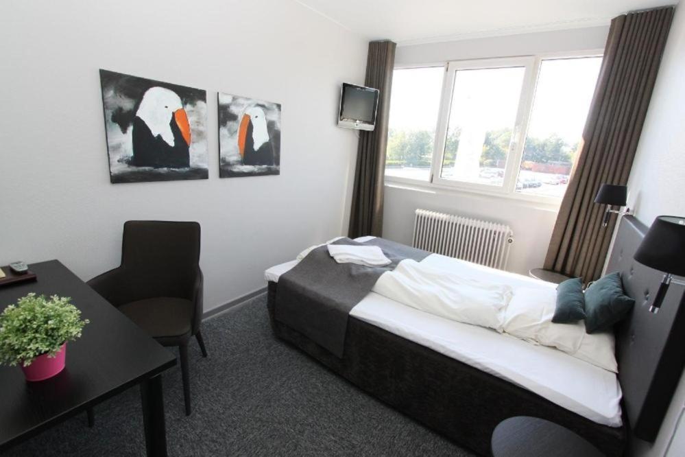 Banegaardshotellet Vojens Kültér fotó