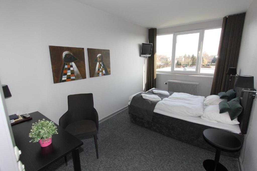 Banegaardshotellet Vojens Kültér fotó